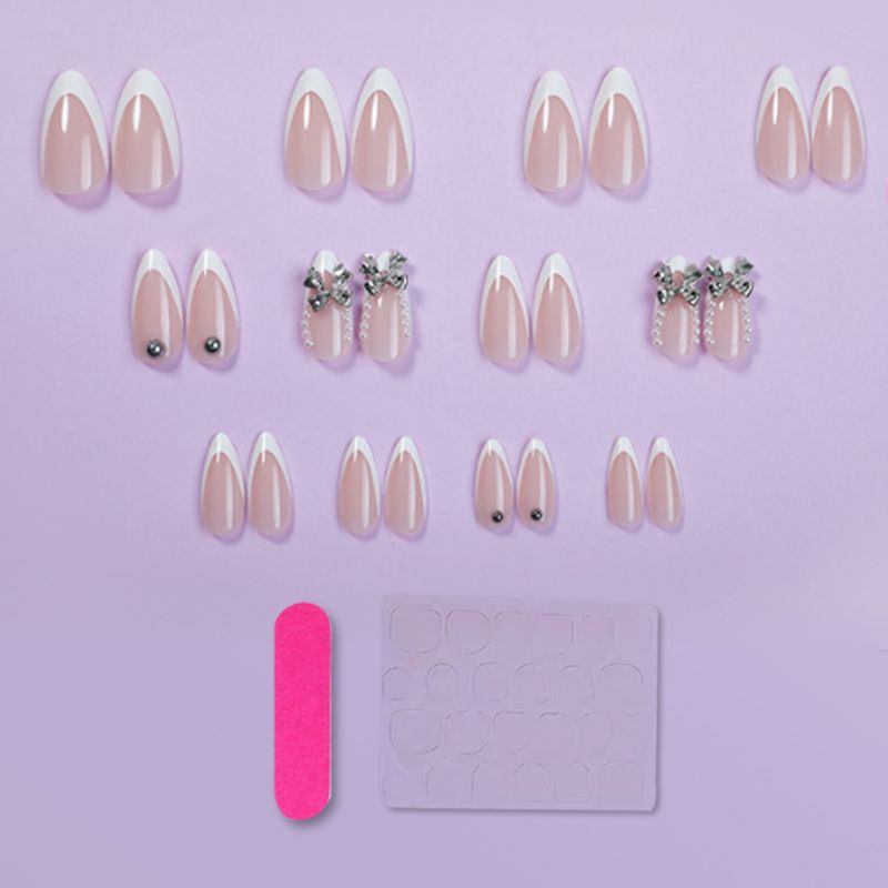 Artificial nail set with elegant French tips and decoration accents Stornfield