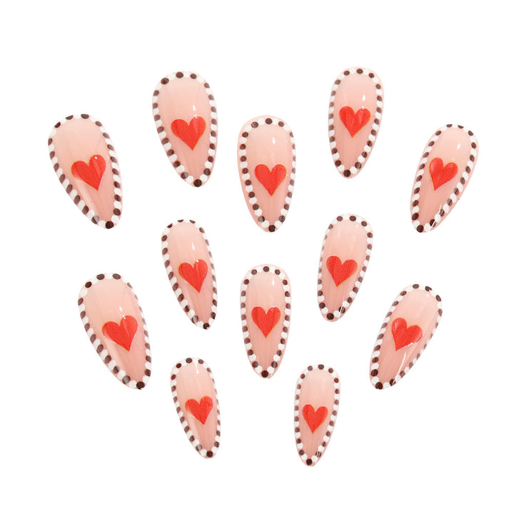 Artificial nails with heart-shaped accents Stornfield