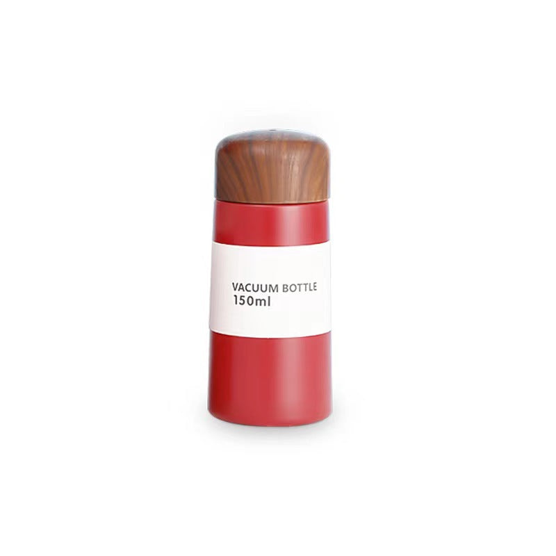 Women vacuum-insulated water bottle with innovative wooden lid Stornfield