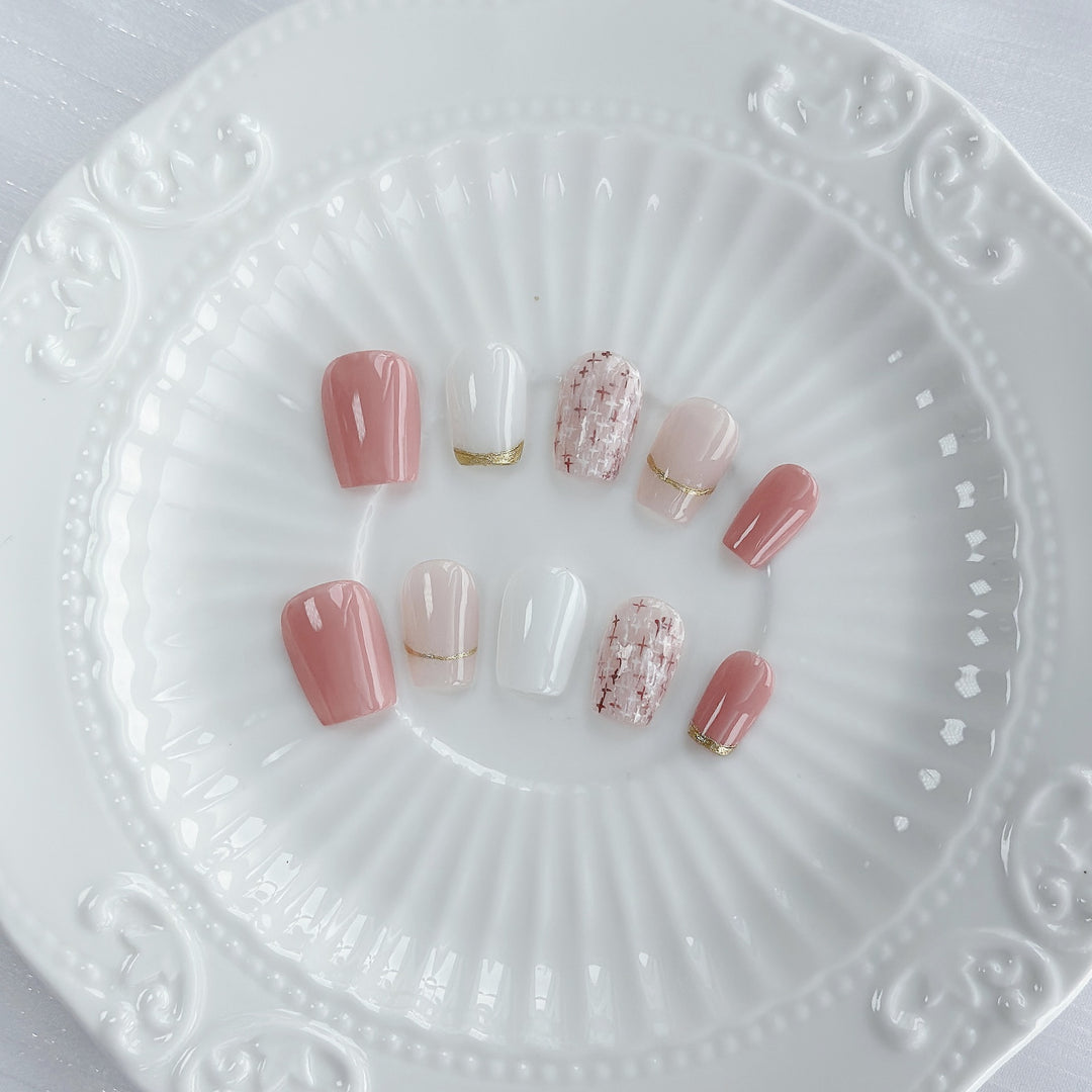 Elegant Press-On Nail Art Set with Gold and Pink Accents