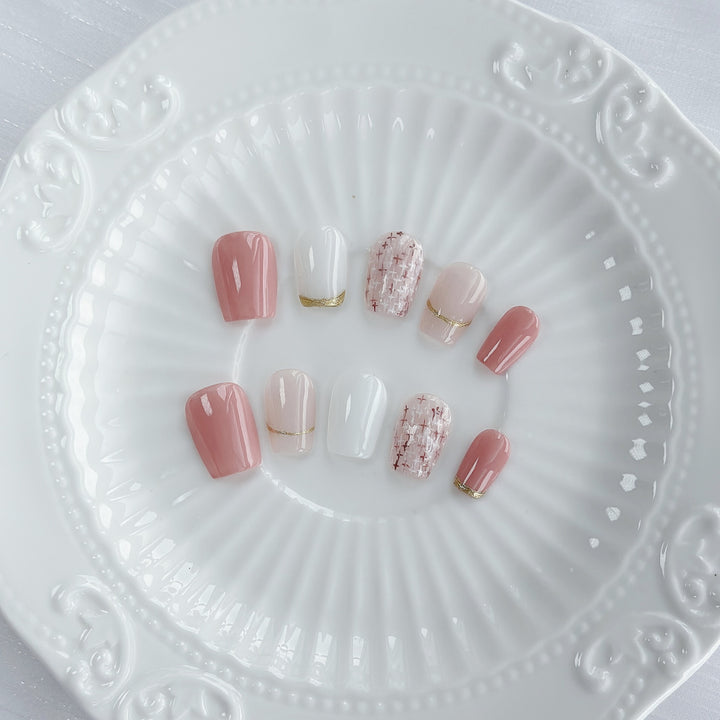 Elegant Press-On Nail Art Set with Gold and Pink Accents