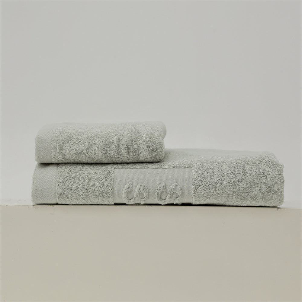 Luxury cotton terry towel set with logo border and extra soft Turquetto structure