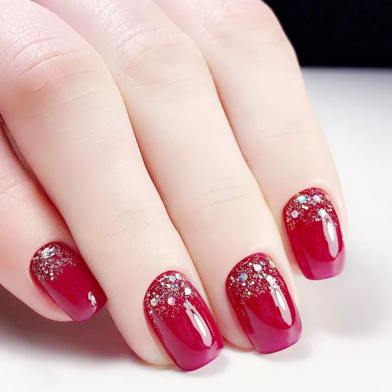 Glamorous artificial nails with glitter accents Stornfield