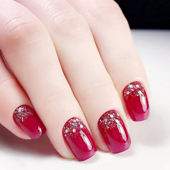 Glamorous artificial nails with glitter accents Stornfield