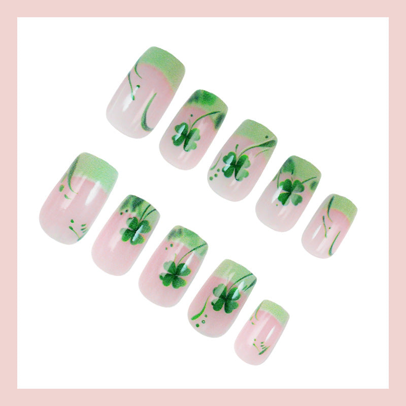 Artificial nail set with festive glitter and clover motifs Stornfield