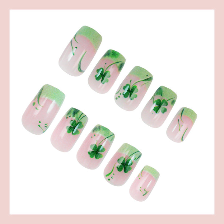 Artificial nail set with festive glitter and clover motifs Stornfield