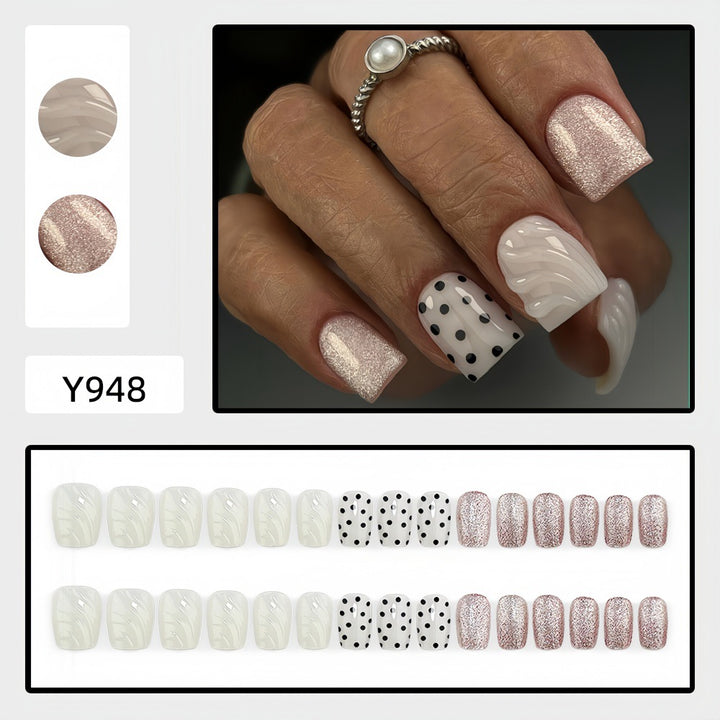Artificial nails with diverse patterns and glitter effects Stornfield