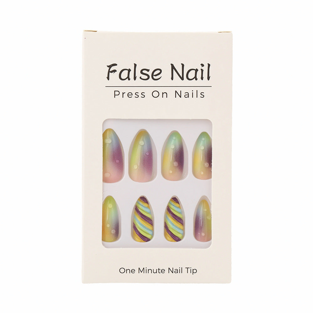 Artificial nails with soft ombre colors and creative patterns Stornfield
