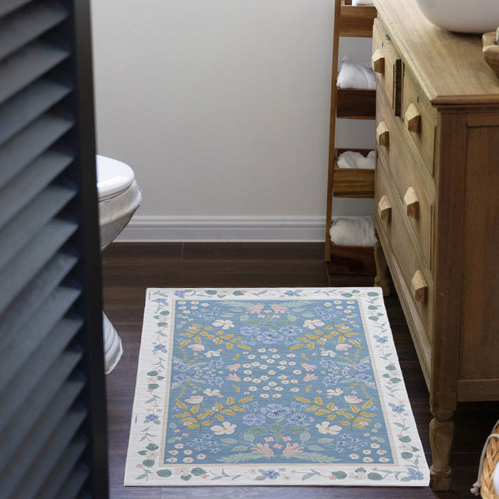 Flat-woven cotton runner with fine floral medallion decor and decorative border