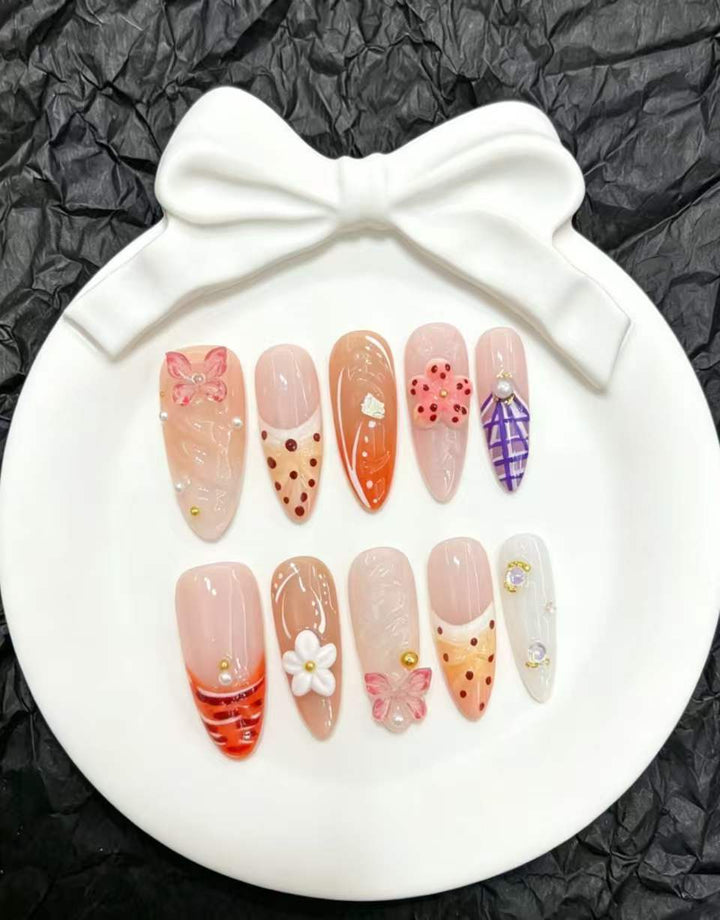Decorative Press-On Nail Art Set with Floral and Whimsical Designs