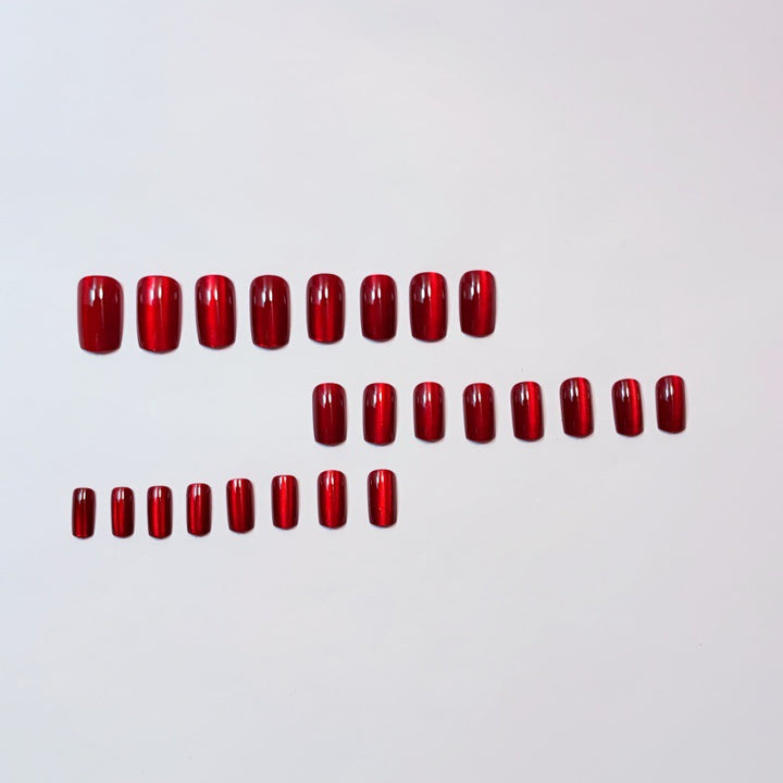 Shiny artificial nails with luxurious effect Stornfield