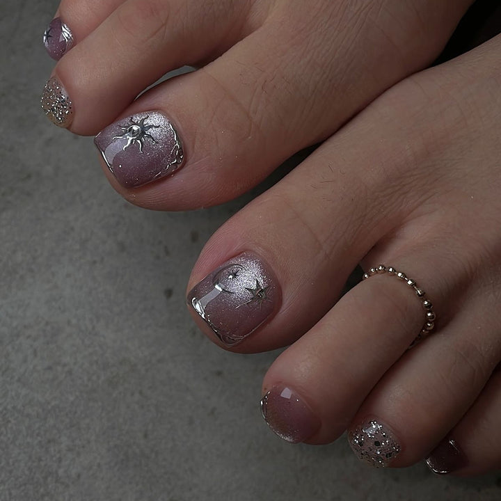 Nail art set with silver star and glitter accents Stornfield