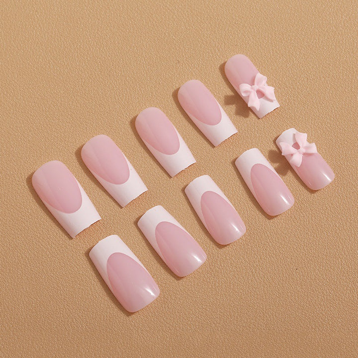 Art nail set with delicate bow decorations Stornfield