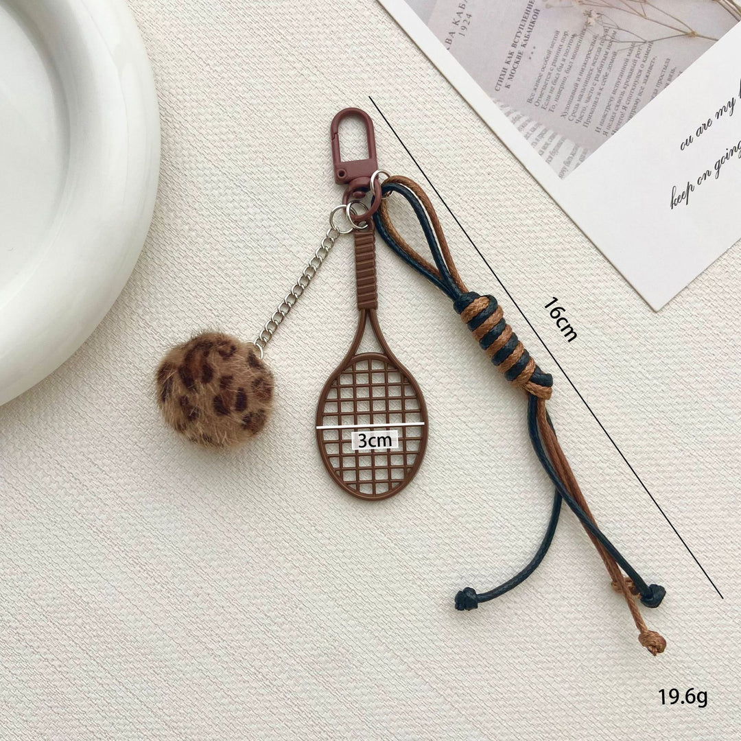Tennis Racket and Fur Ball Keychain Stornfield