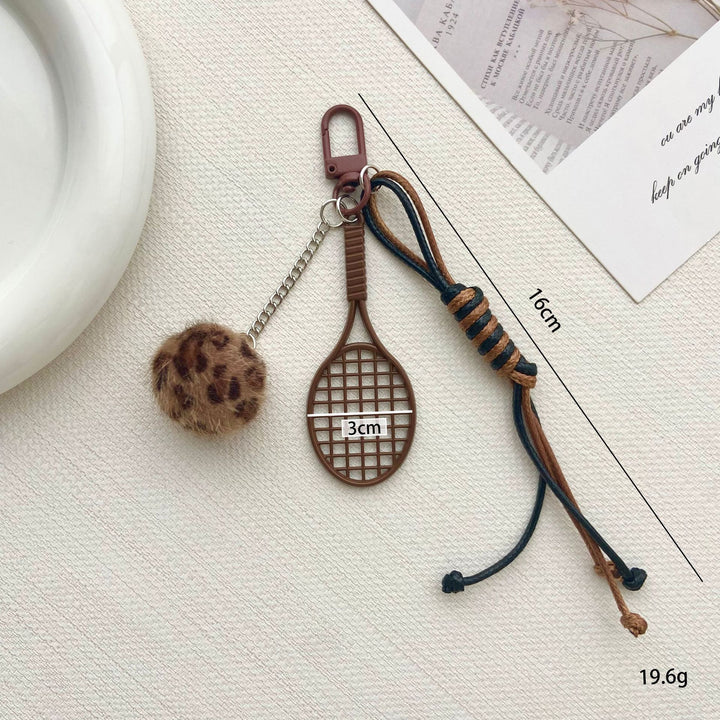 Tennis Racket and Fur Ball Keychain Stornfield