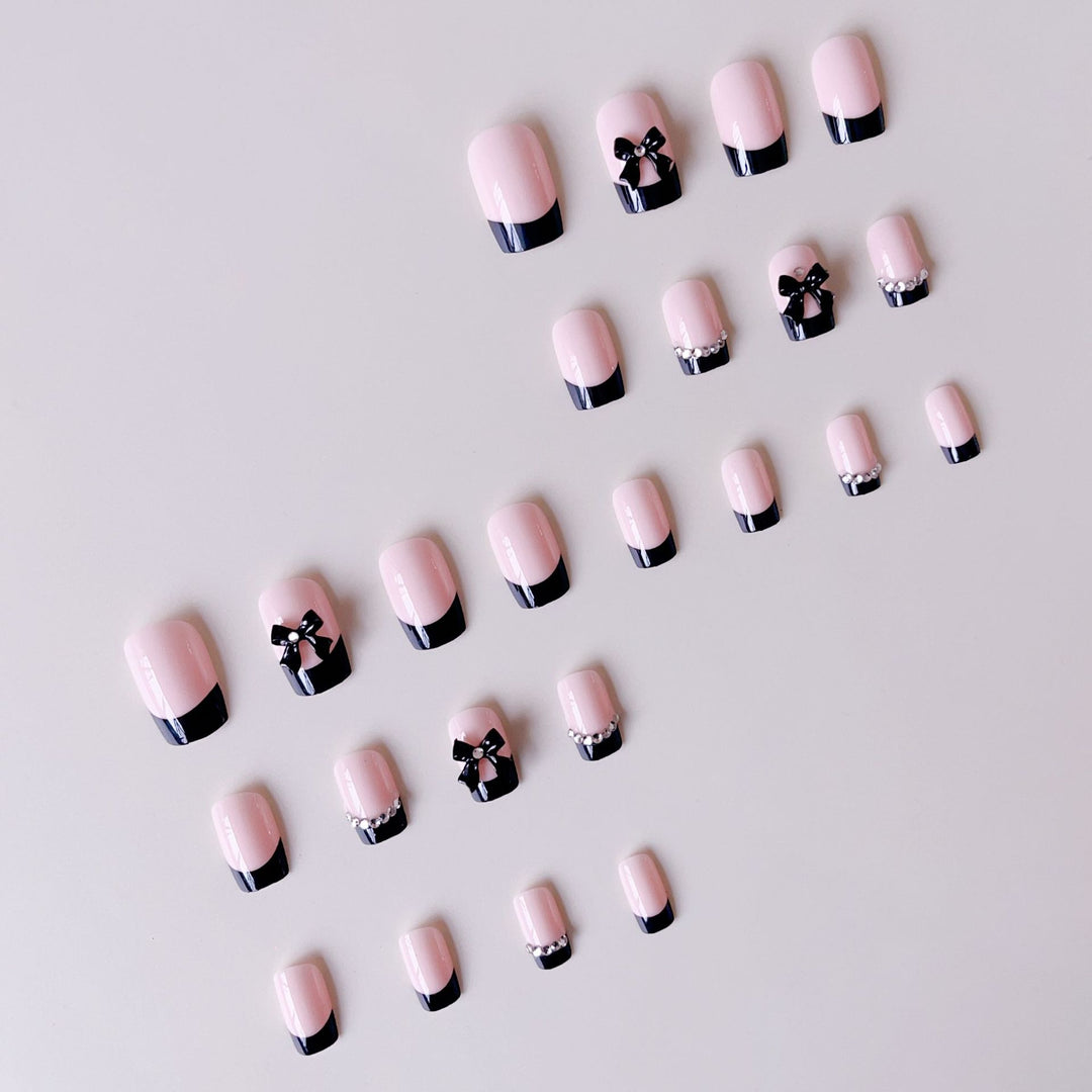 Artificial Nail Set with Elegant Bows and Glitter Decorations Stornfield