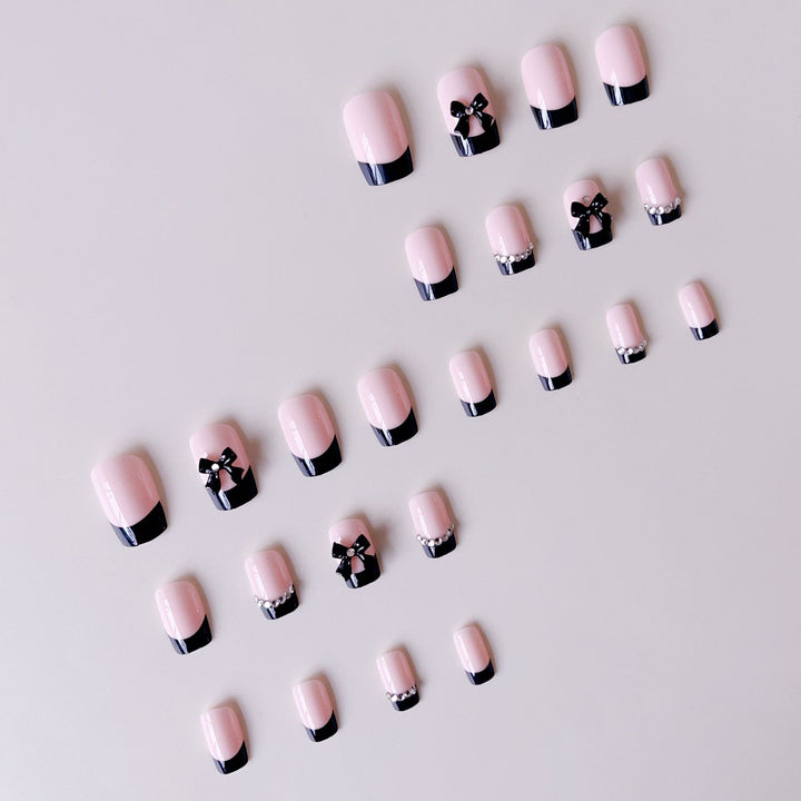 Artificial Nail Set with Elegant Bows and Glitter Decorations Stornfield