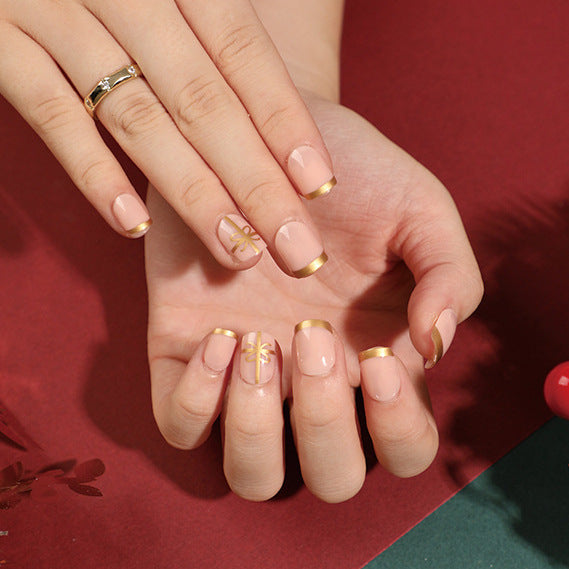 Elegant nail design with gold accents Stornfield