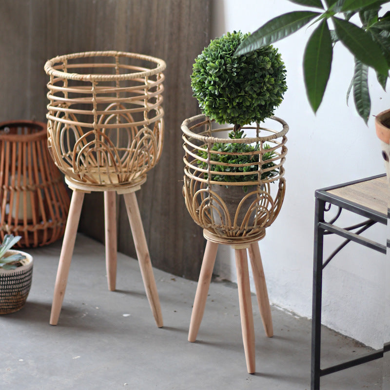 Stylish plant stand made of rattan and wood Stornfield