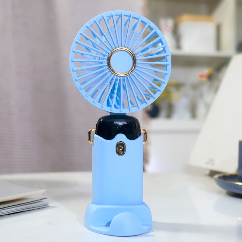 Women's Portable Hand Fan with Integrated Spray Function and USB Charging Option Stornfield
