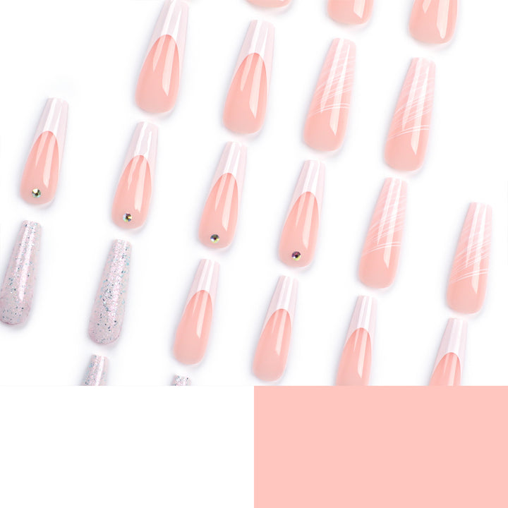Artificial nail extensions with elegant glitter design Stornfield