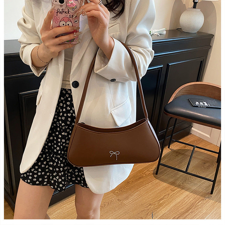 Elegant Curved Handbag Stornfield