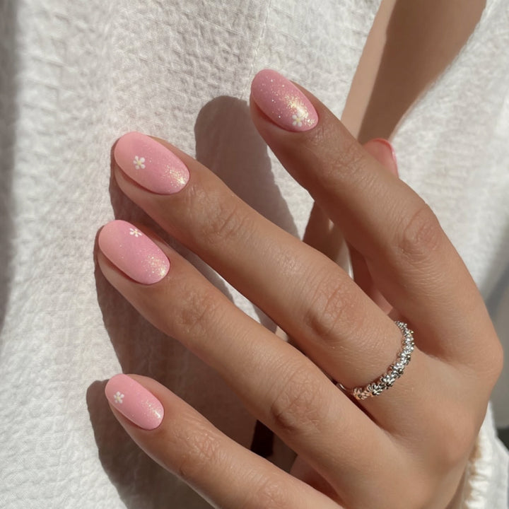 Elegant Nail Art with delicate floral motifs Stornfield