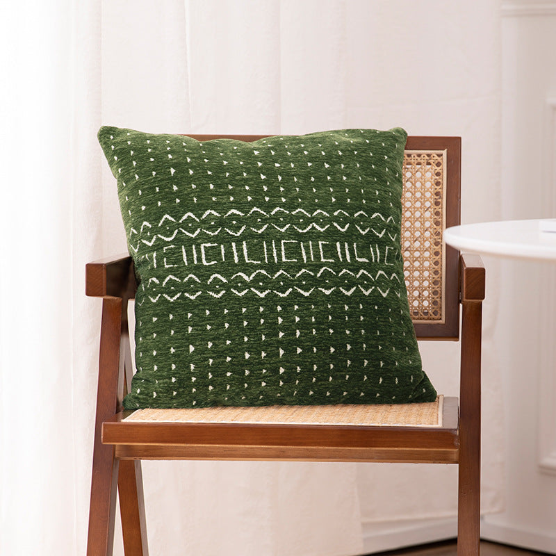 Decorative cushion cover with woven jacquard structure and ethnic motif