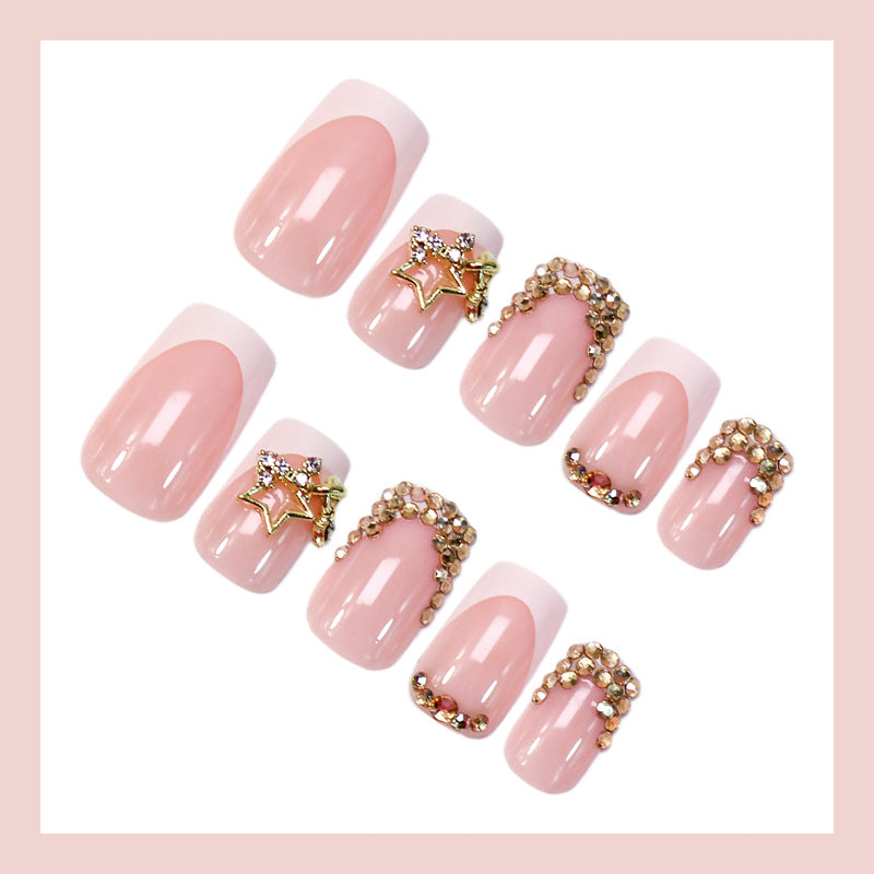 False nail set with glitter accents and holiday design Stornfield