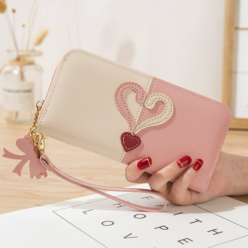 Stylish wallet with heart appliqués Stornfield