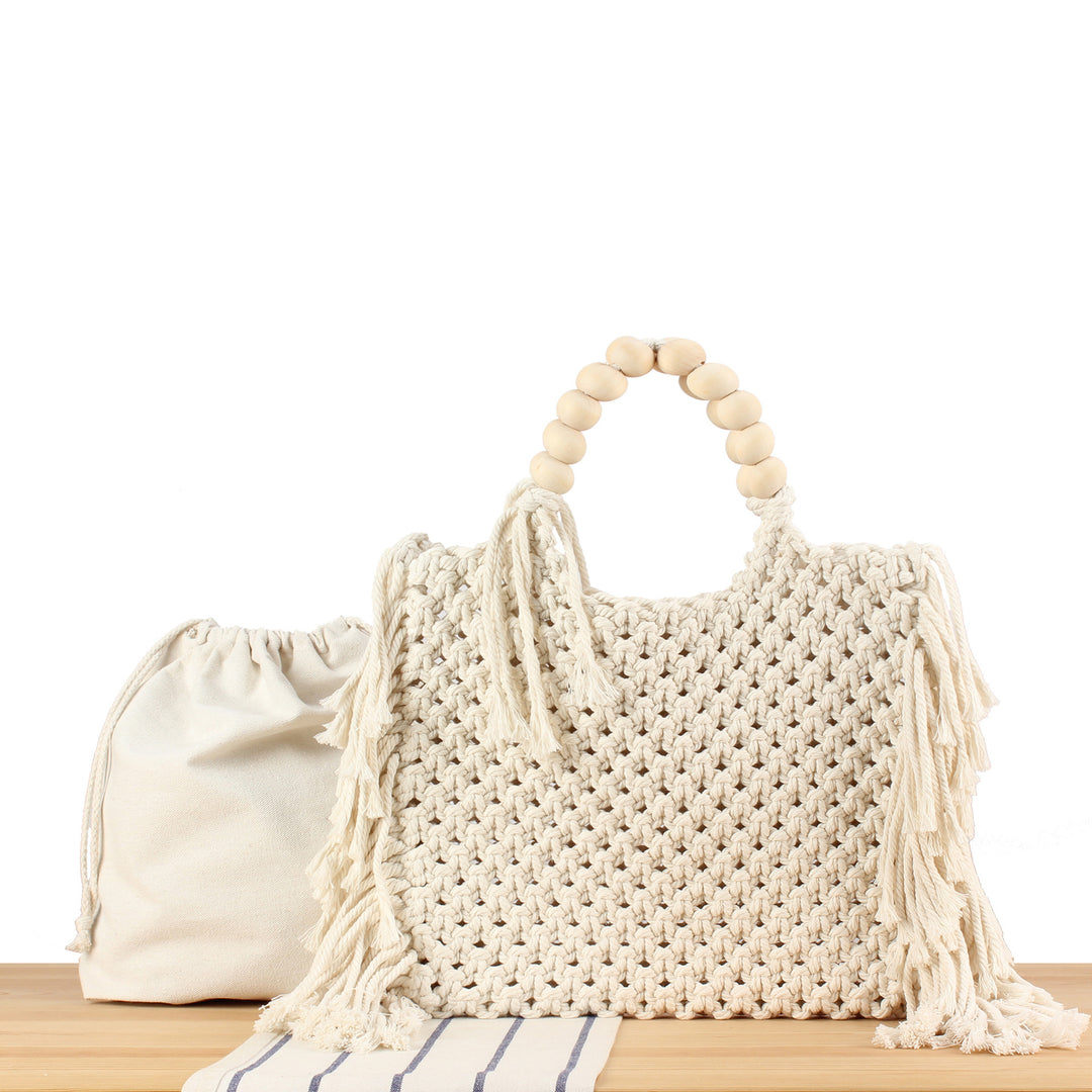 Creative crochet handbag with decorative fringes Stornfield