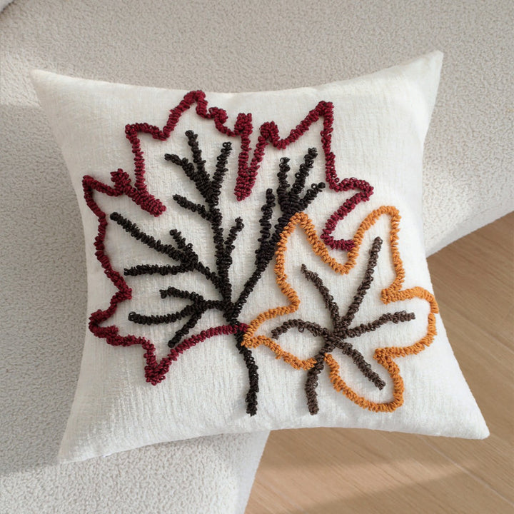 Decorative cushion with autumn leaf design