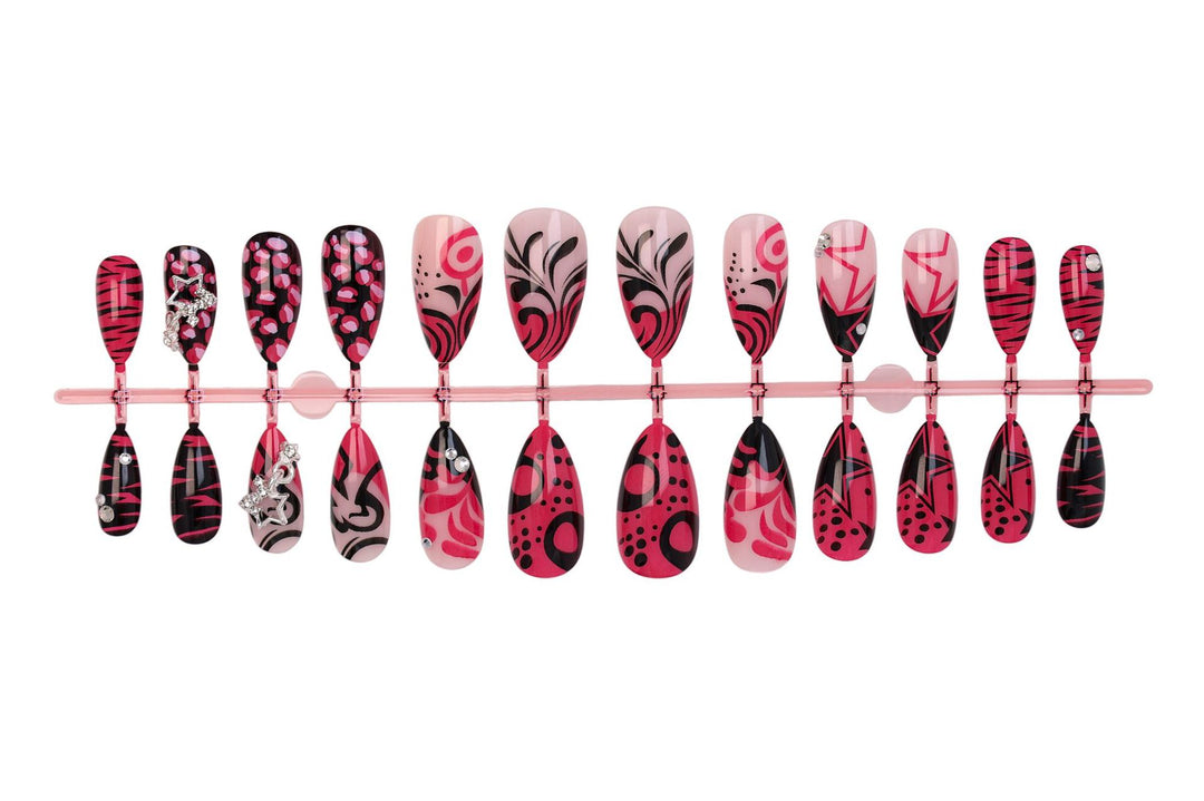 Nail art set with playful patterns and rhinestone embellishments Stornfield