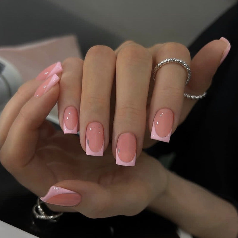 Nail set with elegant French tip and sparkling accents Stornfield