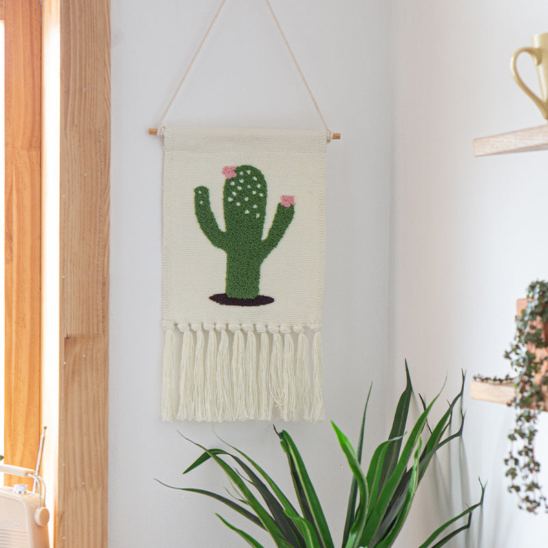 Woven cotton blend wall hanging with tufted cactus motif and cotton fringes Stornfield