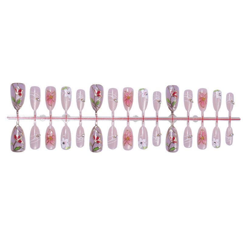 Nail art set with filigree floral decorations and shiny details Stornfield