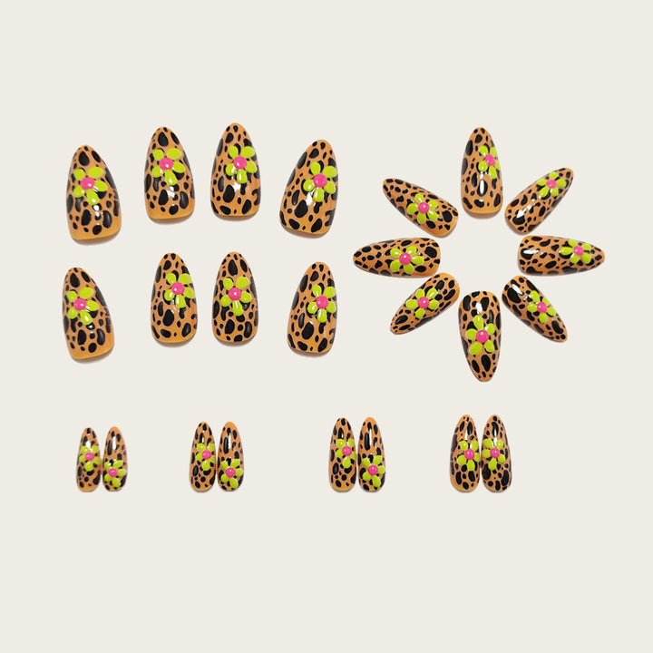 Glamorous nail art with leopard pattern and flower appliqués Stornfield