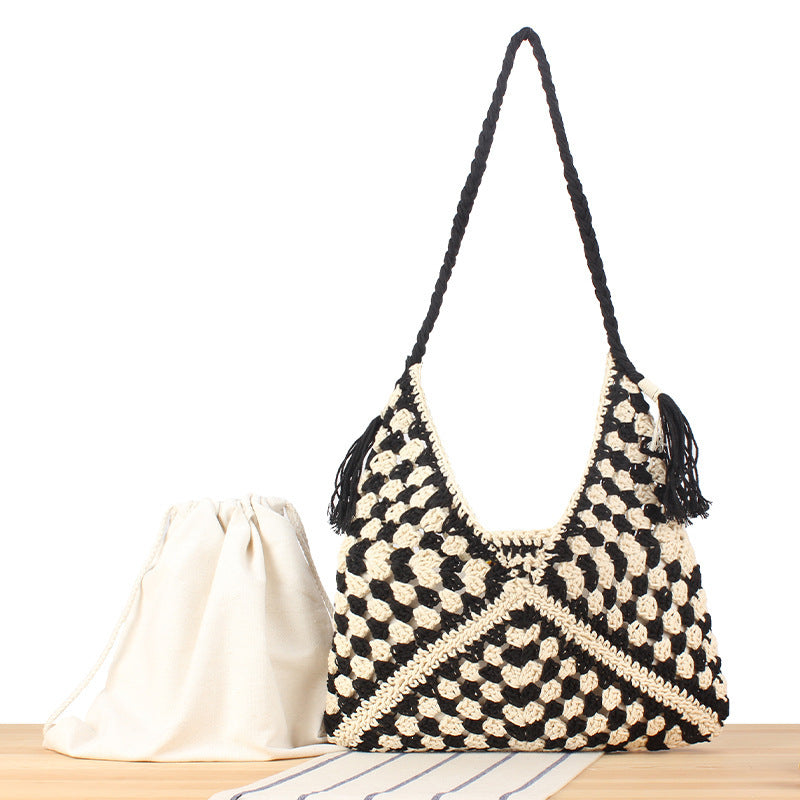 Handbag with artistic macrame design and durable inner bag Stornfield