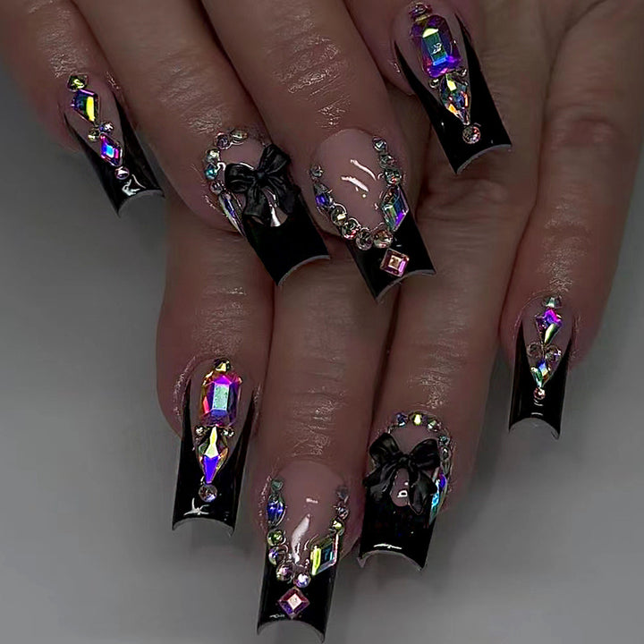 Glamorous artificial nail set with sparkling rhinestone and bow decorations Stornfield