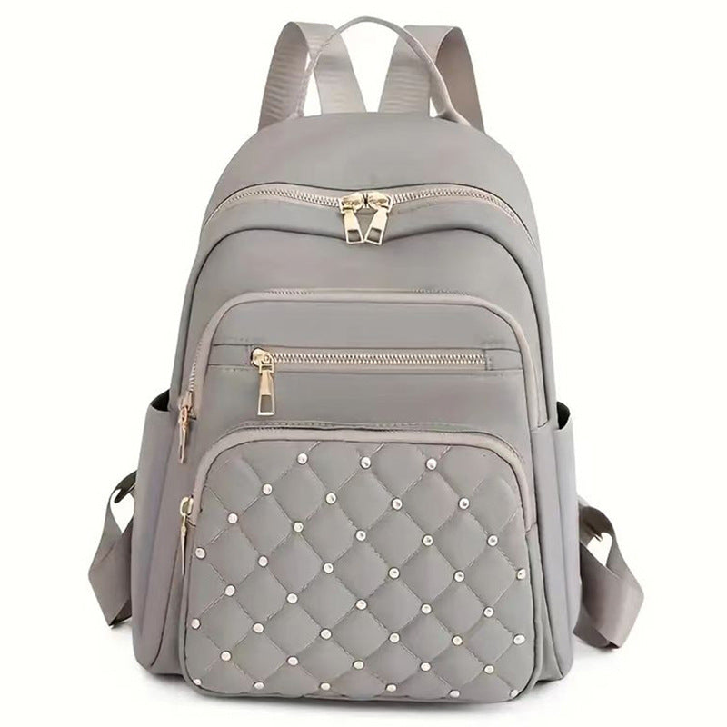 Women's Quilted Backpack with Decorative Studs Stornfield