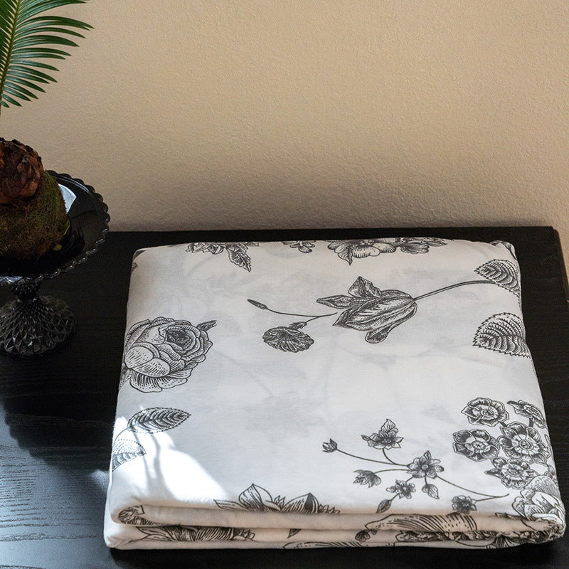 Organic Cotton Muslin Swaddle Blanket with Playful Cartoon Print