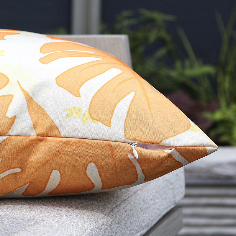 Square outdoor cushion cover made of water-repellent polyester with tropical Monstera print Stornfield