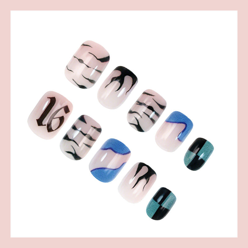 Nail set with modern graphic designs and shimmering accents Stornfield