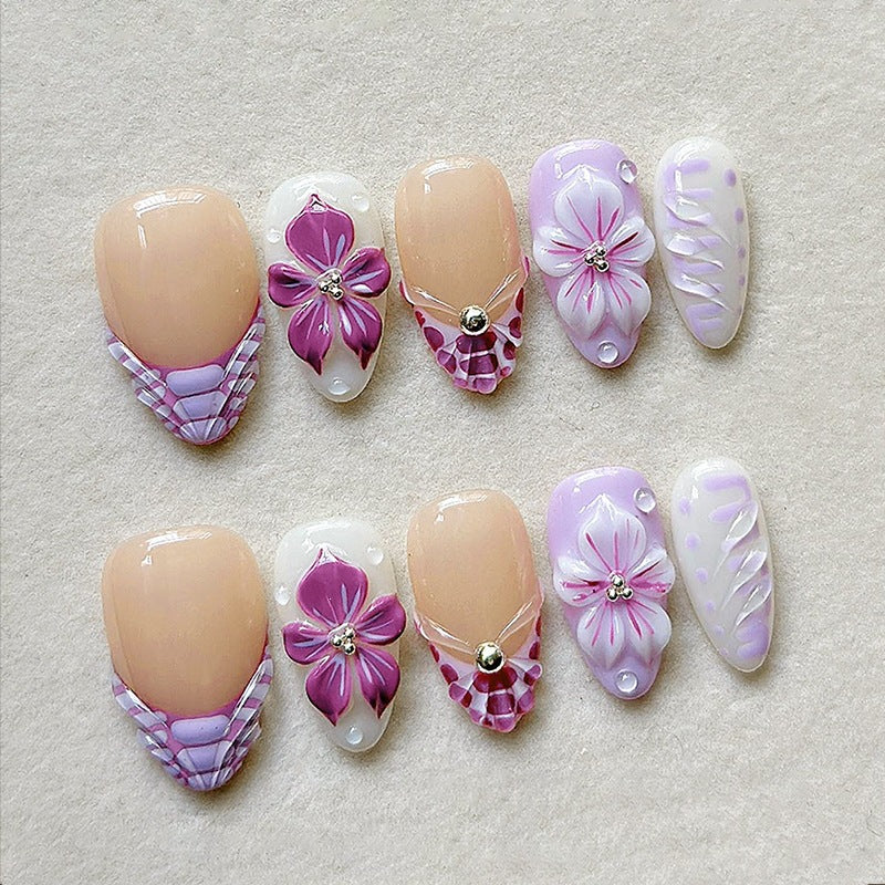 Artificial nail set with floral and glamorous accents Stornfield