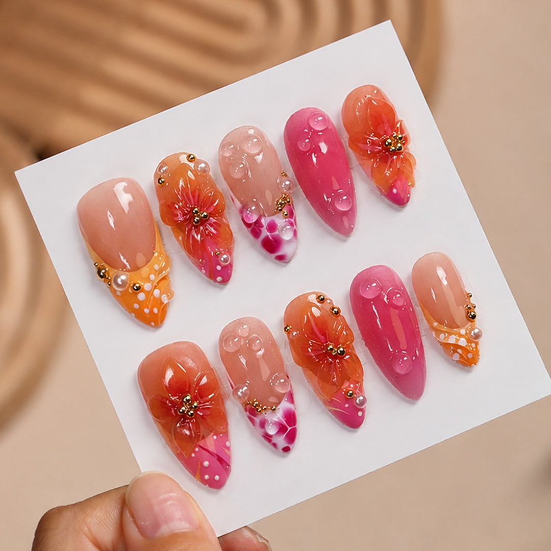 Artificial nail set with floral designs and elegant embellishments Stornfield