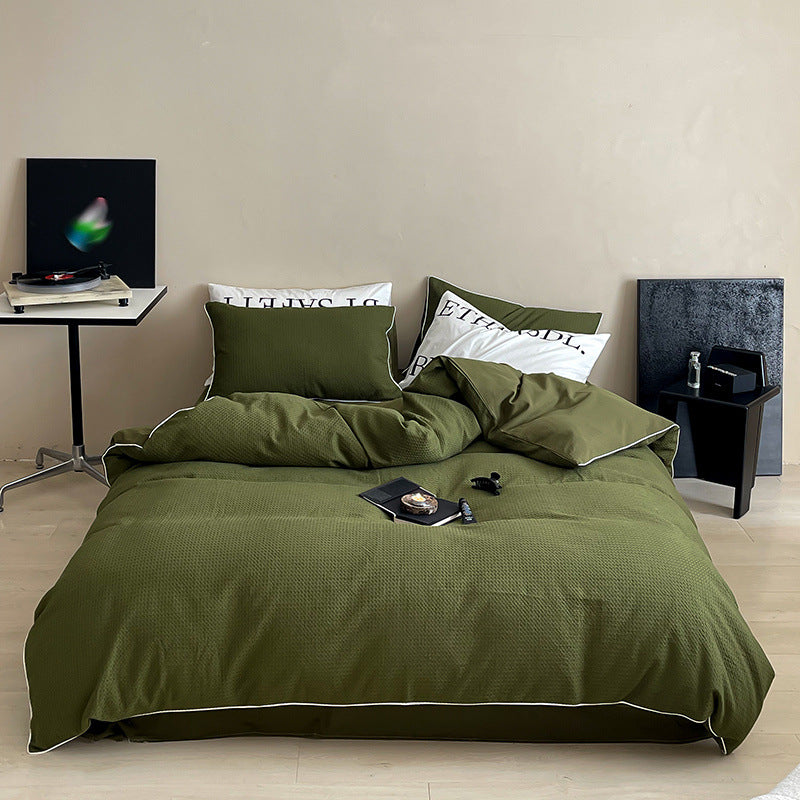 Textured cotton waffle duvet cover with pillowcases and fine contrasting piping