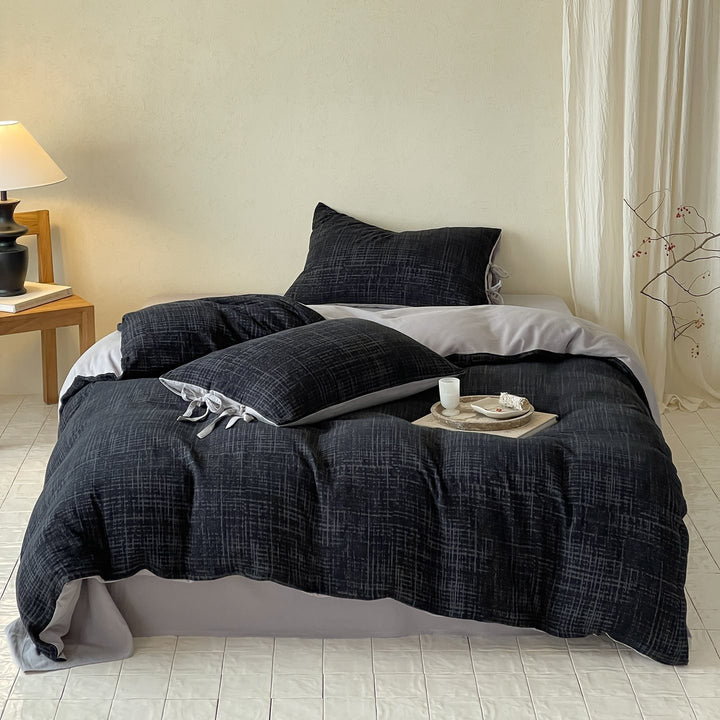 Reversible bedding set made of cotton satin with textured cross pattern and pillowcases with ties