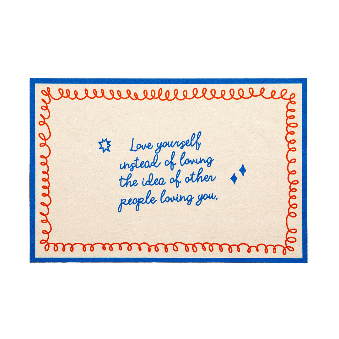 rectangular door mat made of canvas with typographic lettering