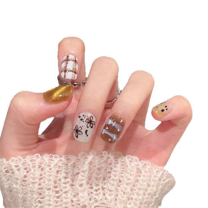 Artistic Press-On Nail Set with Unique Design Elements Stornfield