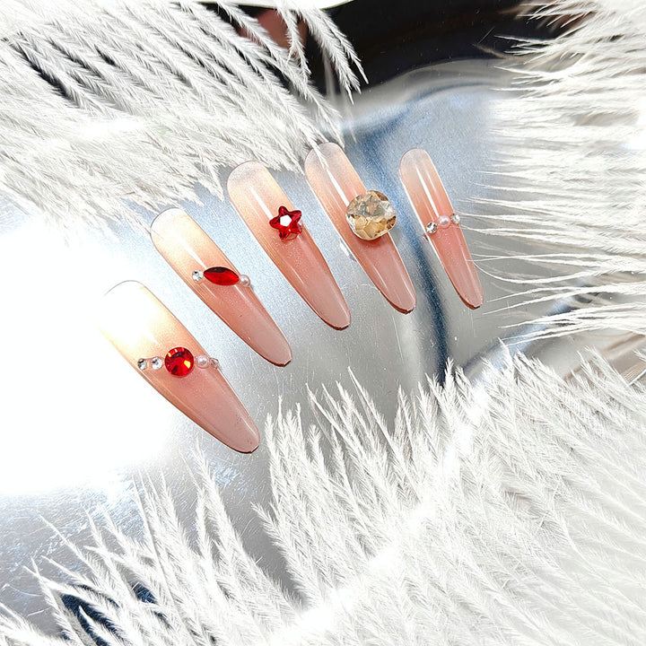 Sparkling artificial nails with decorative rhinestones Stornfield